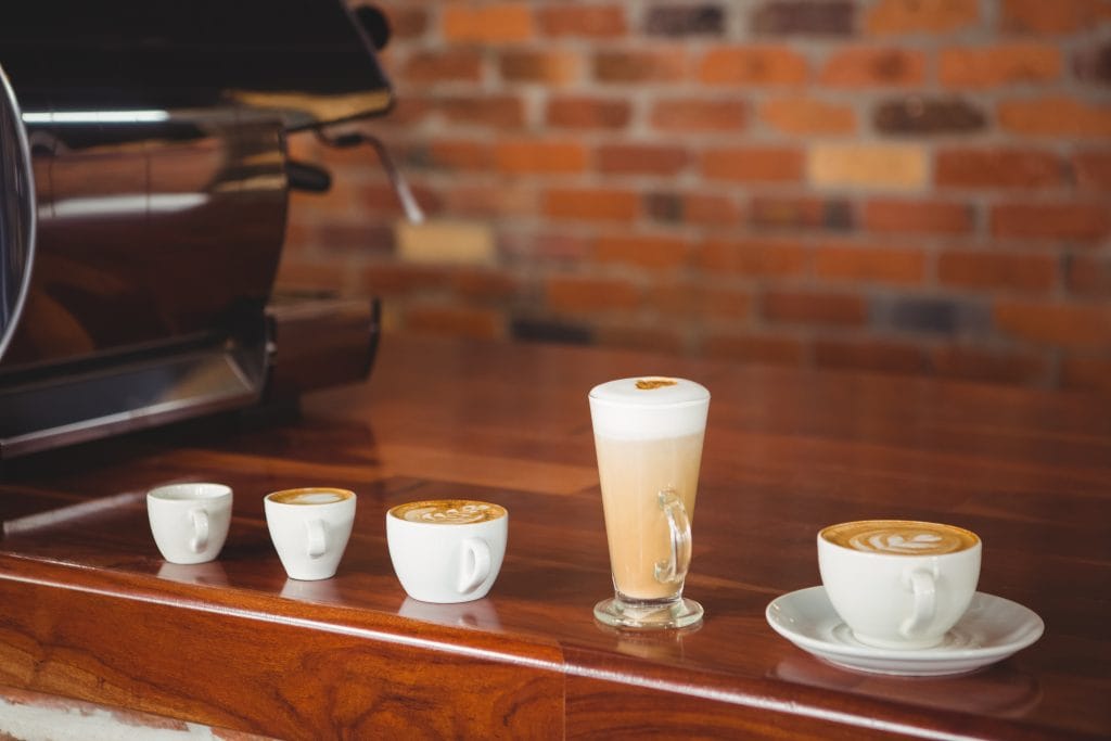 Several Hot Beverages In A Row On The Counter At C 2025 04 04 04 03 50 Utc