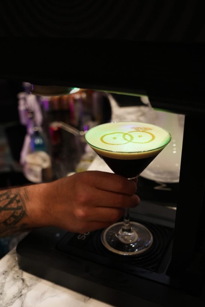 Espresso martini with wedding rings printed on the crema using the Ripples machine at a Mr Flavour bar