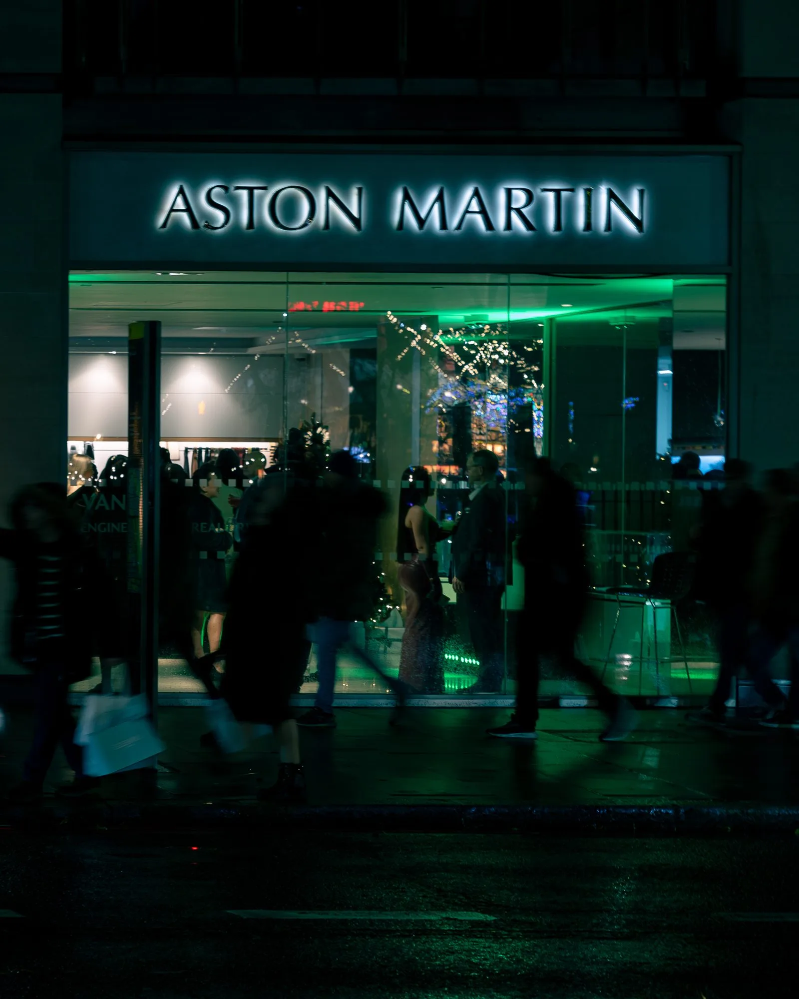 Guests arriving at the Aston Martin Mayfair showroom on the evening of the Vanquish launch