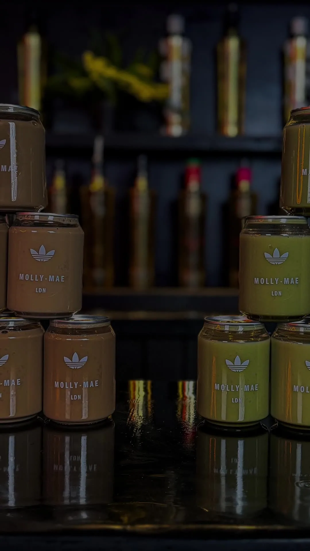 Branded Adidas x Molly-Mae iced matcha and iced latte cans