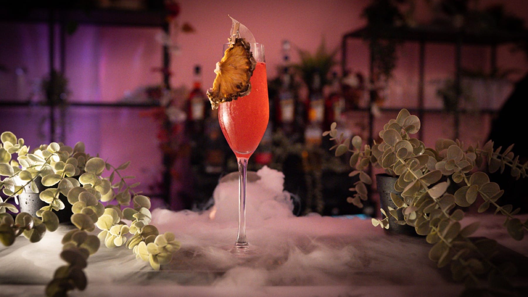 Pink branded drinks at a P.Louise event
