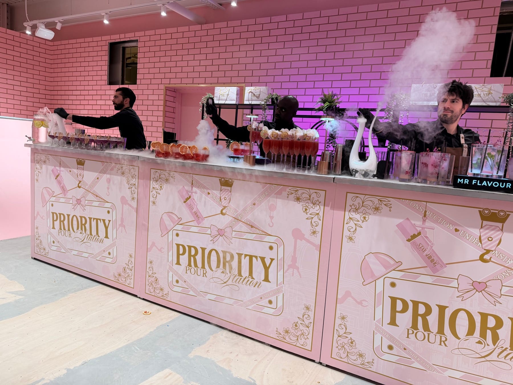 Custom pink P.Louise Priority Pour branded bar by Mr Flavour