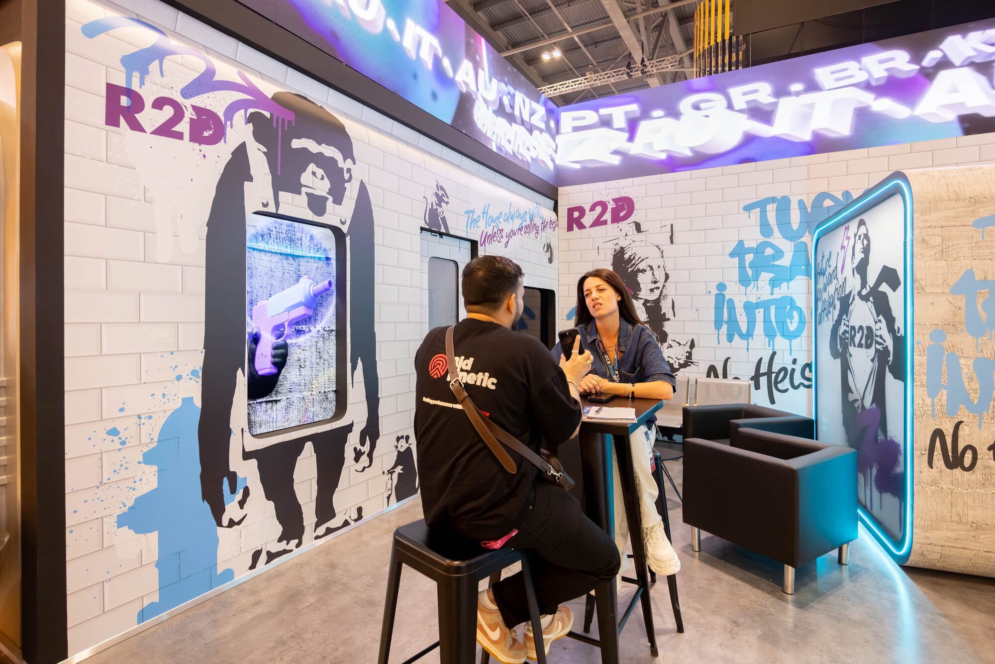 Graffiti styled bar booth built into the R2D stand