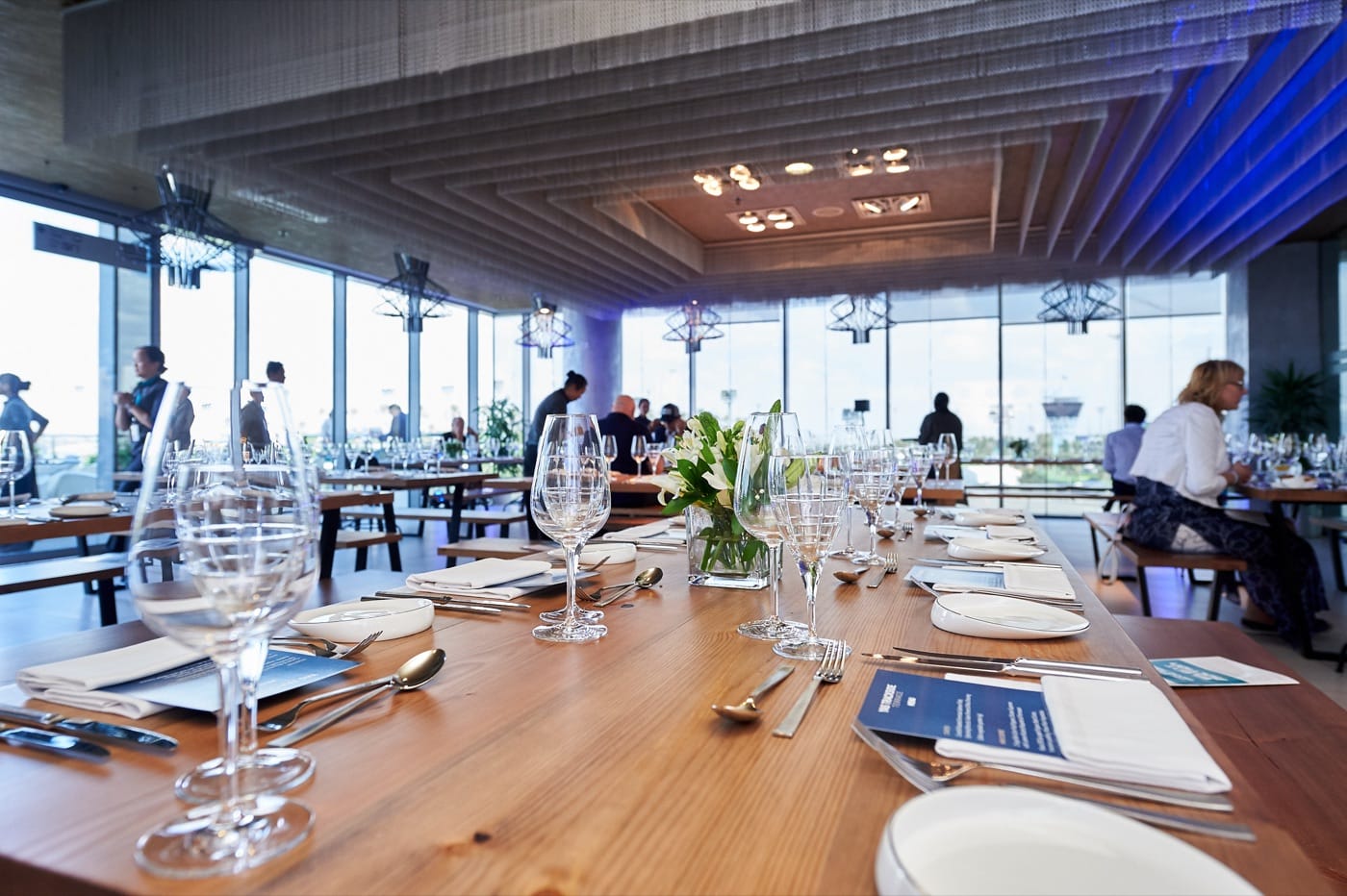 A premium Mr Flavour hospitality suite set for dining overlooking the Yas Marina Circuit at the Abu Dhabi Grand Prix