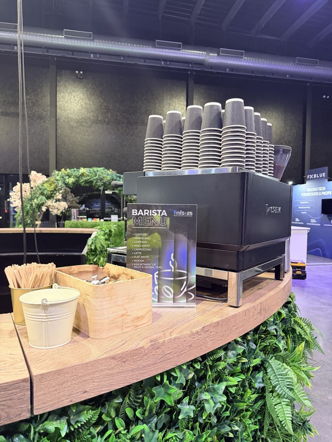 The Mr Flavour branded barista coffee station with the FMLS:25 barista menu at the Finance Magnates London Summit
